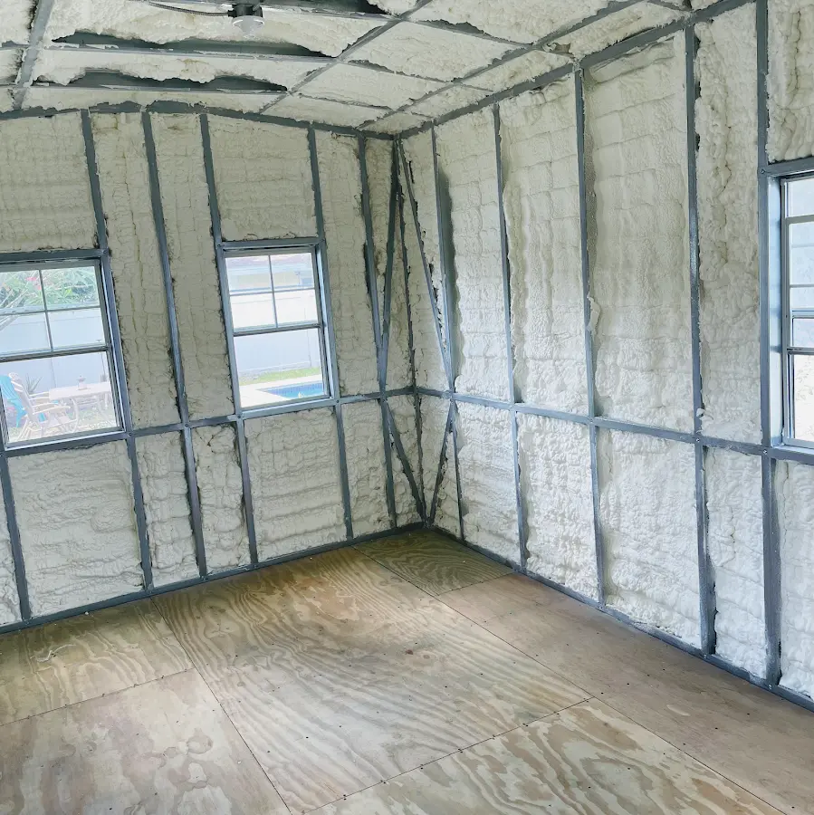 Closed-cell spray foam insulation applied to wall cavities in a residential project in New Providence